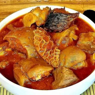Naija crowded stew(half titus, shaki, pomo, chicken, beef, goatmeat )