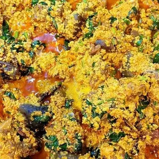 Egusi mixed with shaki, goatmeat chicken