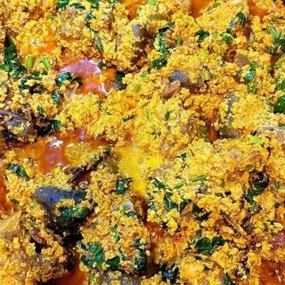 Egusi mixed with shaki, goatmeat chicken 