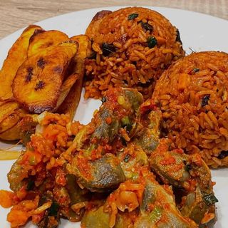 Jollof rice, plantains and peppered Gizzards 