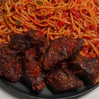 Spicy sphaghetti served with spicy beefcubes 