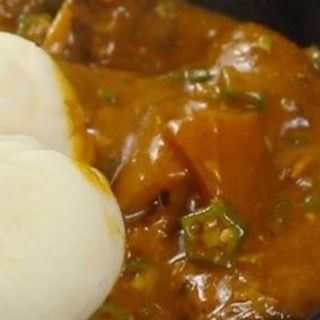 Ogbono mixed with okro and assorted served with Pounded yam 