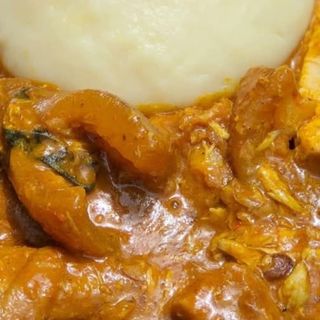 Ogbono mixed with Assorted, served with Pounded yam 