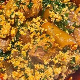 Egusi mixed with pomo and titus fish