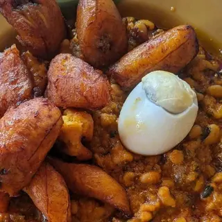 Oloyin beans porridge, plantains and boiled egg