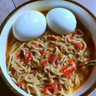 Noodles peppe soup mixed with 2 boiled eggs
