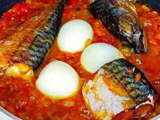 3 boiled eggs mixed with titus fish in spicy Nigerian sauce