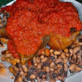 Oloyin beans served with cowleg in spicy sauce