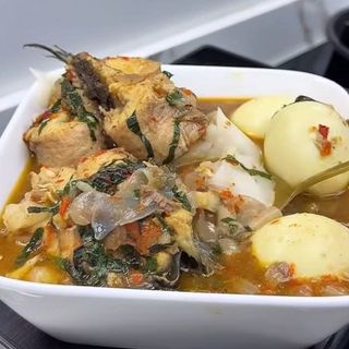 Catfish peppe soup mixed with 3 boiled eggs
