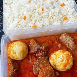 White rice served with spicy beef stew mixed with 2 boiled eggs