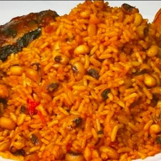 Jollof rice mixed with white oloyin beans