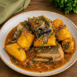 Catfish peppe soup mixed with boiled plantains