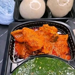 Pounded yam served with ewedu and Assorted meat 