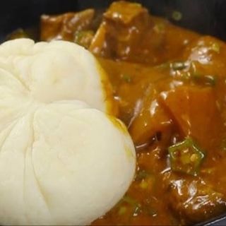 Pounded yam served with okro mixed with pomo 