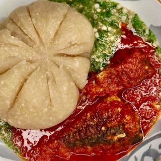 White Eba served with okro mixed with croaker fish