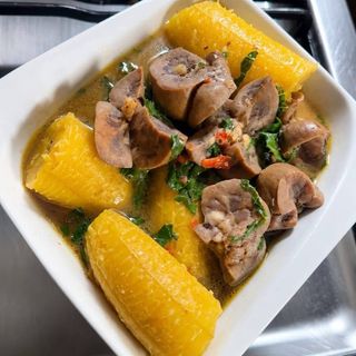 Goat kidney peppe soup mixed with boiled plantains