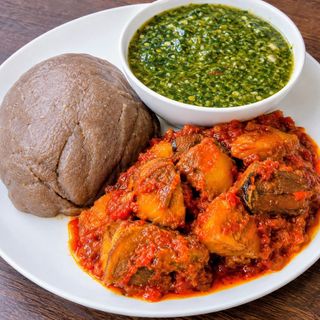 Amala served with okro and peppered assorted beef shaki pomo