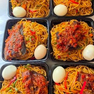 6 portions of jollof Sphaghetti, boiled egg and croaker fish