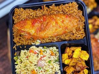 Jollof rice, fried rice, plantains and turkey wing