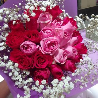 Pink and Red rose flowers with baby's breath.