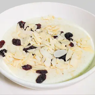 Hot Oatmeal Porridge with Almonds, Raisins & Brown Sugar