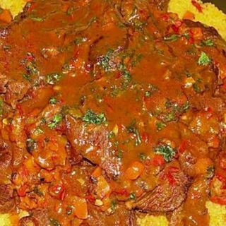 CAMEL CURRY(served with a choice of rice,chapati,ugali)