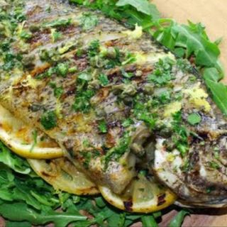 WHOLE FISH IN LEMON BUTTER SAUCE(served with either ugali/chips)