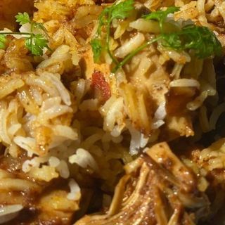 Goat Biryani +Mango juice