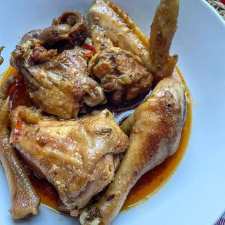 Half kienyeji chicken with ugali and sukuma wiki