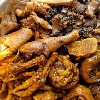 Whole kuku kienyeji-stewed