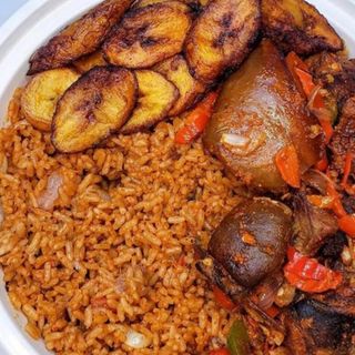 Jollof rice, goat meat, & plantain
