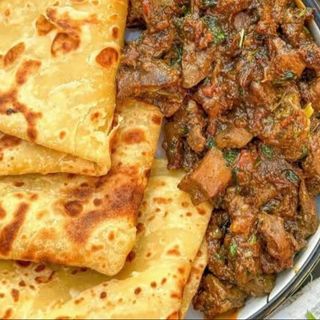 2 Chapatis wet fry goat