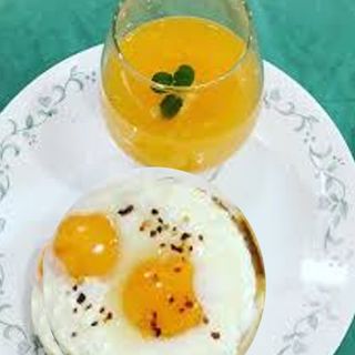 Fried Eggs, Toast and Juice