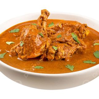 Chicken Curry served with ugali or rice.