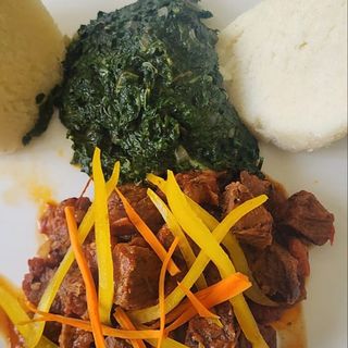 Dry fry beef served with creamed spinach