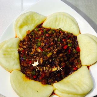 47Мелко нарезанная говядина с попушками 饼夹肉