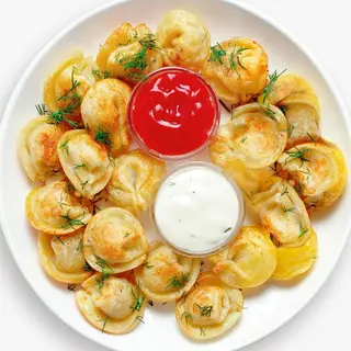 Пельмени жареные 
