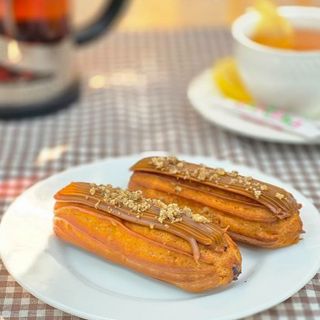 Эклер сливочный с вареной сгущенкой 50гр