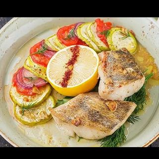Судак с овощами 