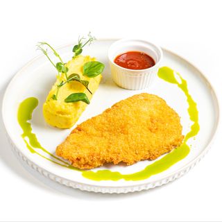 Шницель из куриного филе с гарниром на выбор (300г)