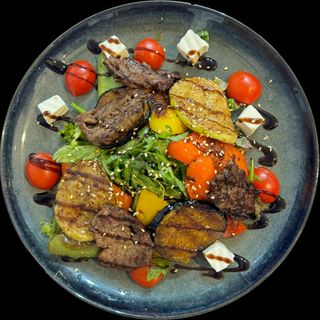 Телятина на гриле с овощами