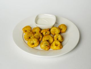 Жареные пельмени со сметаной (250 гр)