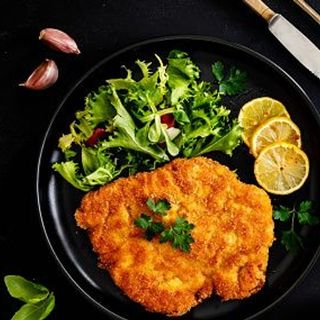 Шницель куриный с грибным соусом