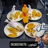 4 sandwichs shawarma poulets avec frites et un litre de soda