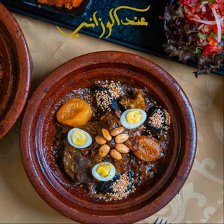 Tagine Lham Bel Berkok W Mechmach, Besla W Zbib