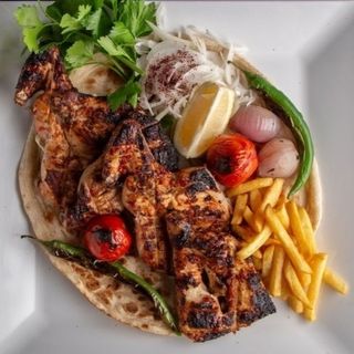 Poulet (1kg) على الفحم