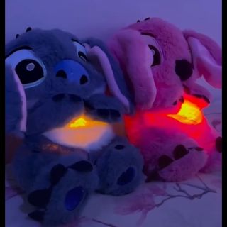 الدبدوبان ستيتش وانجل بموسيقى واضاء جميلة يتنفس