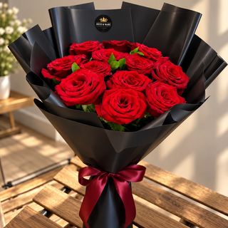 Bouquet De Fleurs Rouges Emballé En Noir