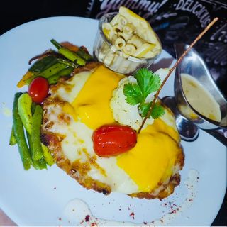 Escalopes de poulet panées alla parmigiana