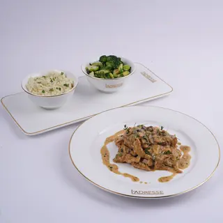 Emincé de poulet à la crème aux champignons Fotestiers